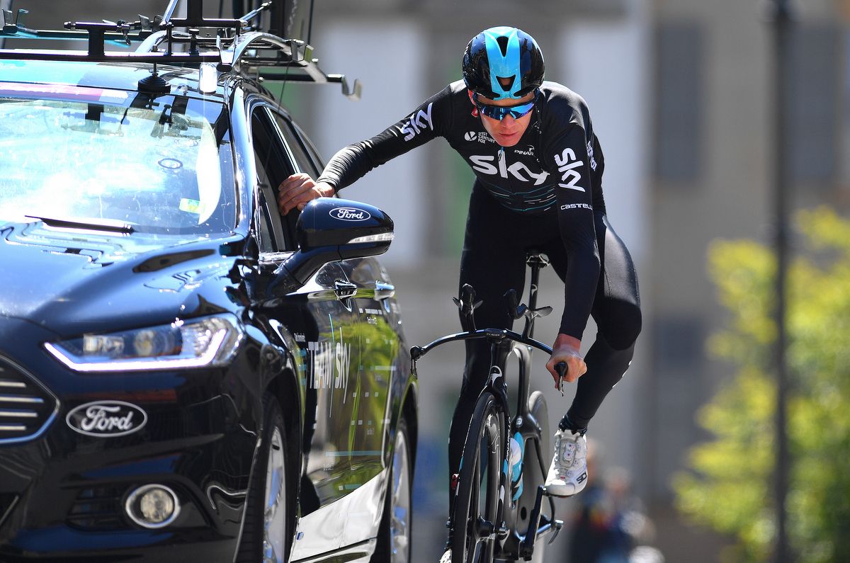 Chris Froome at the team car during his warm up ride
