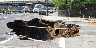 A massive sinkhole emerged in the Sunset Park neighborhood of Brooklyn, New York, on Aug. 4, 2015.