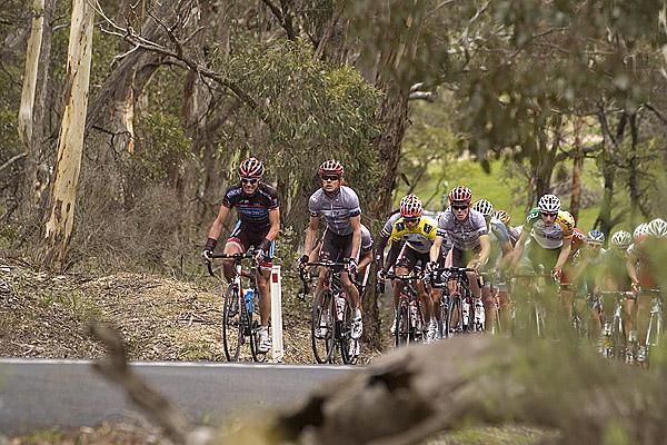 The chasing peloton climb their way towards Anakie on the second lap still around two-and-a-half minutes behind the lead group.