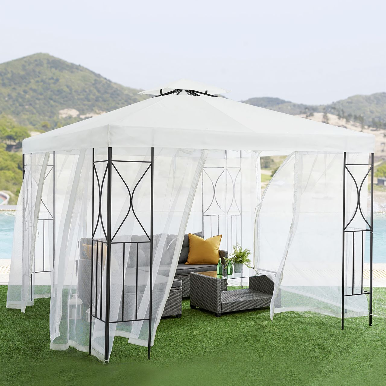 White gazebo with mosquito netting