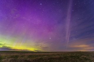 The appearance of the infamous STEVE glowing arc south of the main auroral curtains, on May 27-28, 2022 from home in southern Alberta.