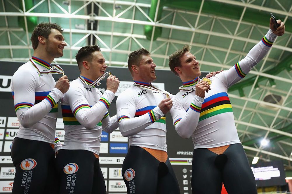 Matthijs Buchli, Roy van den Berg, Harrie Lavreysen and Jeffrey Hoogland of the Netherlands pose for a selfie after they win gold in the Men's team sprint final