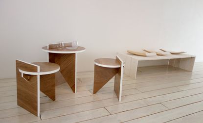Pictured are the 'Origin part III: Contrast' stools and table, and the 'Origin part II: Contrast' fruit bowl