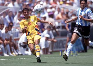 Gheorghe Hagi on the ball for Romania against Argentina at the 1994 World Cup.