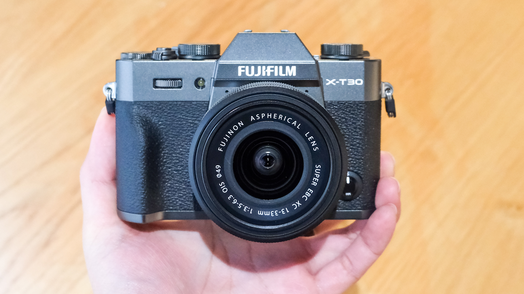 A charcoal Fujifilm X-T30 III mirrorless camera