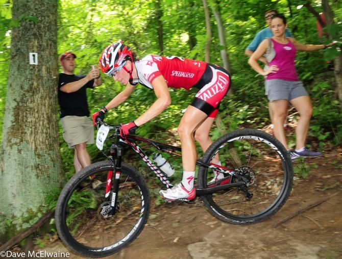 Lea Davison (Specialized) rounding a 180-degree corner on lap two.
