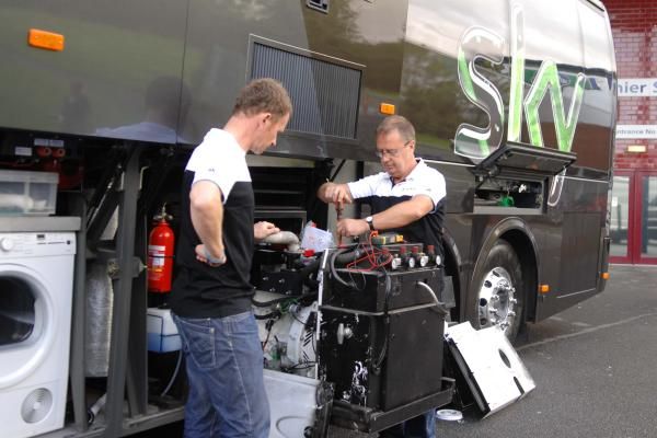 It's washing machine repair time at the Team Sky bus.