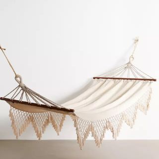 A boho fringed hammock