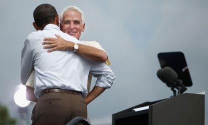 Former Florida Gov. Charlie Crist embraces President Obama during a campaign rally at St. Petersburg College, on Sept. 8.
