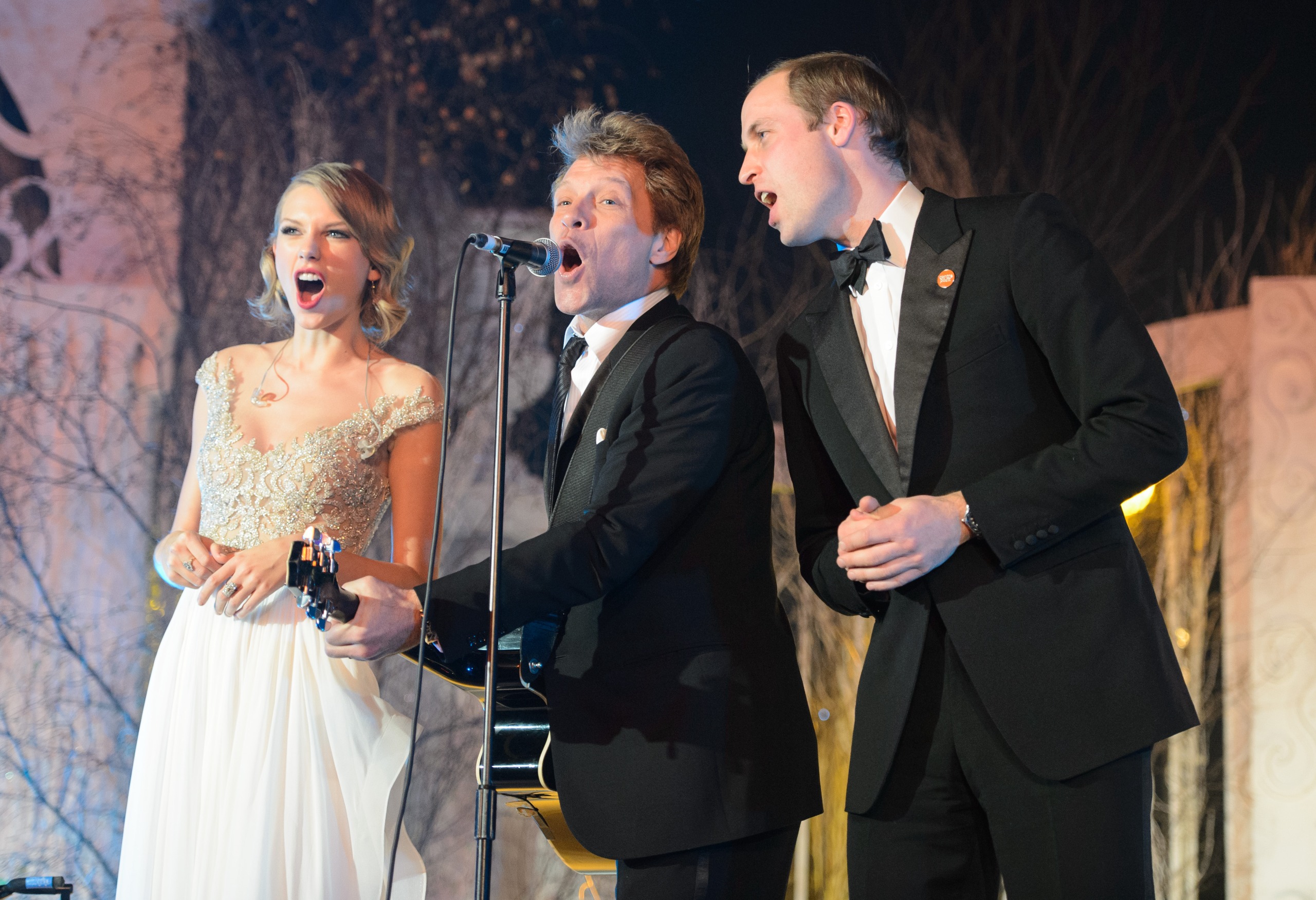 Prince William, Duke of Cambridge and Taylor Swift attend the Winter Whites Gala In Aid Of Centrepoint on November 26, 2013 in London, England.