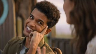 Jordan Fisher smiling in Netflix's Hello, Goodbye, and Everything in Between