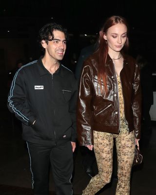 Joe Jonas and Sophie Turner are seen attending the "Cup of Joe" O﻿fficial Concert After Party at 26 Leake Street on April 14, 2023 in London, England.