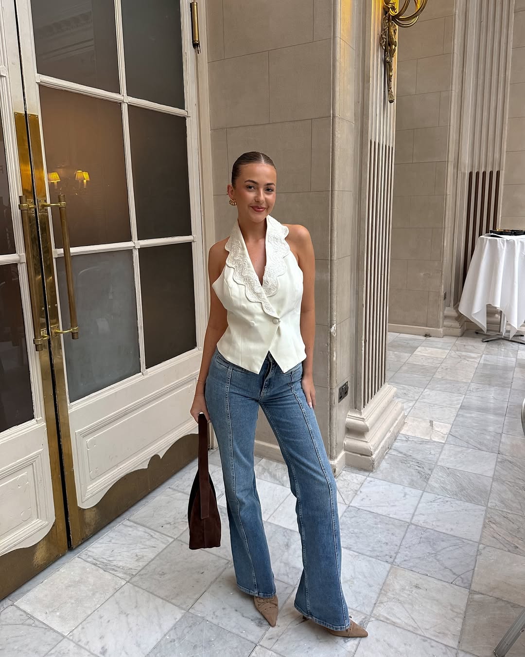 woman wearing neutral color pointed toe shoe trend 2025