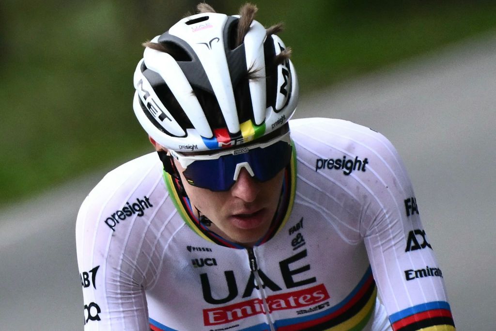 UAE Team Emirates team's Slovenian rider Tadej Pogacar attacks, to take the lead in a lone breakaway in the Colma Di Sormano ascent during the 118th edition of the Giro di Lombardia (Tour of Lombardy), a 252km cycling race from Bergamo to Como on October 12, 2024. (Photo by Marco BERTORELLO / AFP)