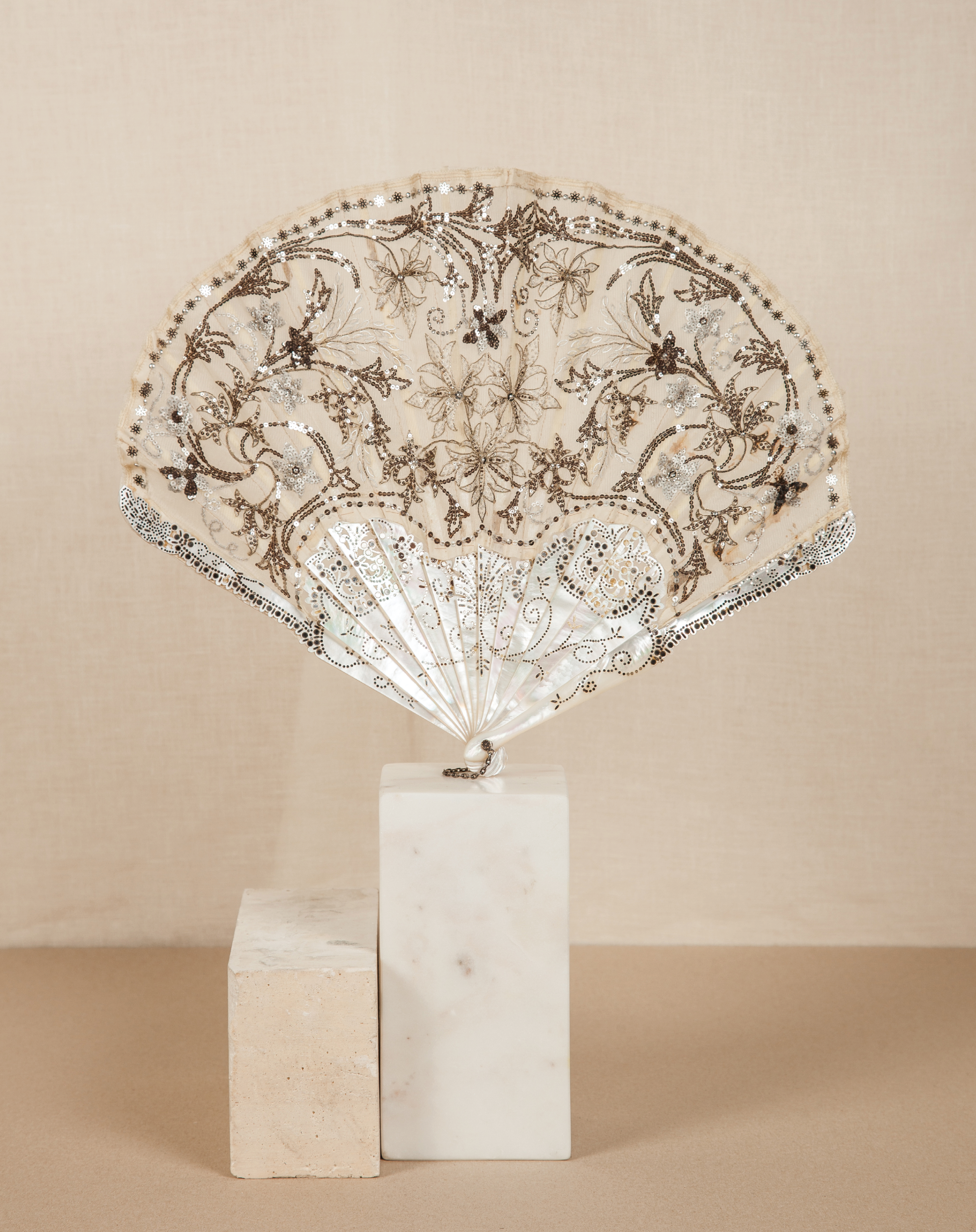 Silver and gold floral-detail fan