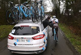 The AG2R team car tends to a rider during stage 1 at Paris-Nice