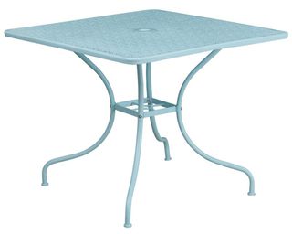 A pale blue 4-person outdoor patio dining table