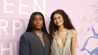 Law Roach and Zendaya posing at the 2024 Green Carpet Fashion Awards