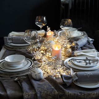 Metallic christmas centrepiece with fairy lights