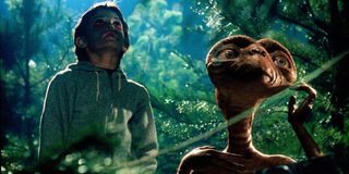 E.T. the Extra-Terrestrial Elliot and ET look up at the skies