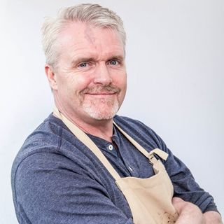 bake off contestant with apron