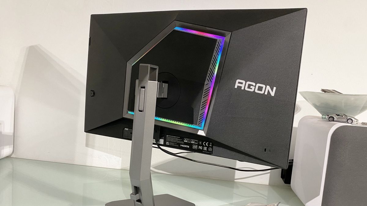 Back of the AOC Agon Pro AG276FK gaming monitor, showing RGB lighting and adjustable stand