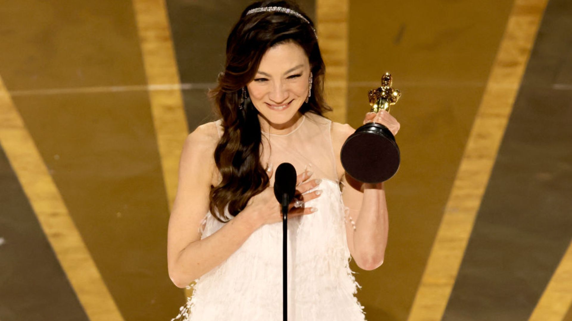 Michelle yeoh accepting the best actress oscar for everything everywhere all at once