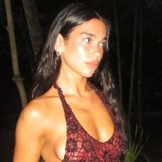 Dua Lipa wears a red lace crochet dress and celebrates her birthday