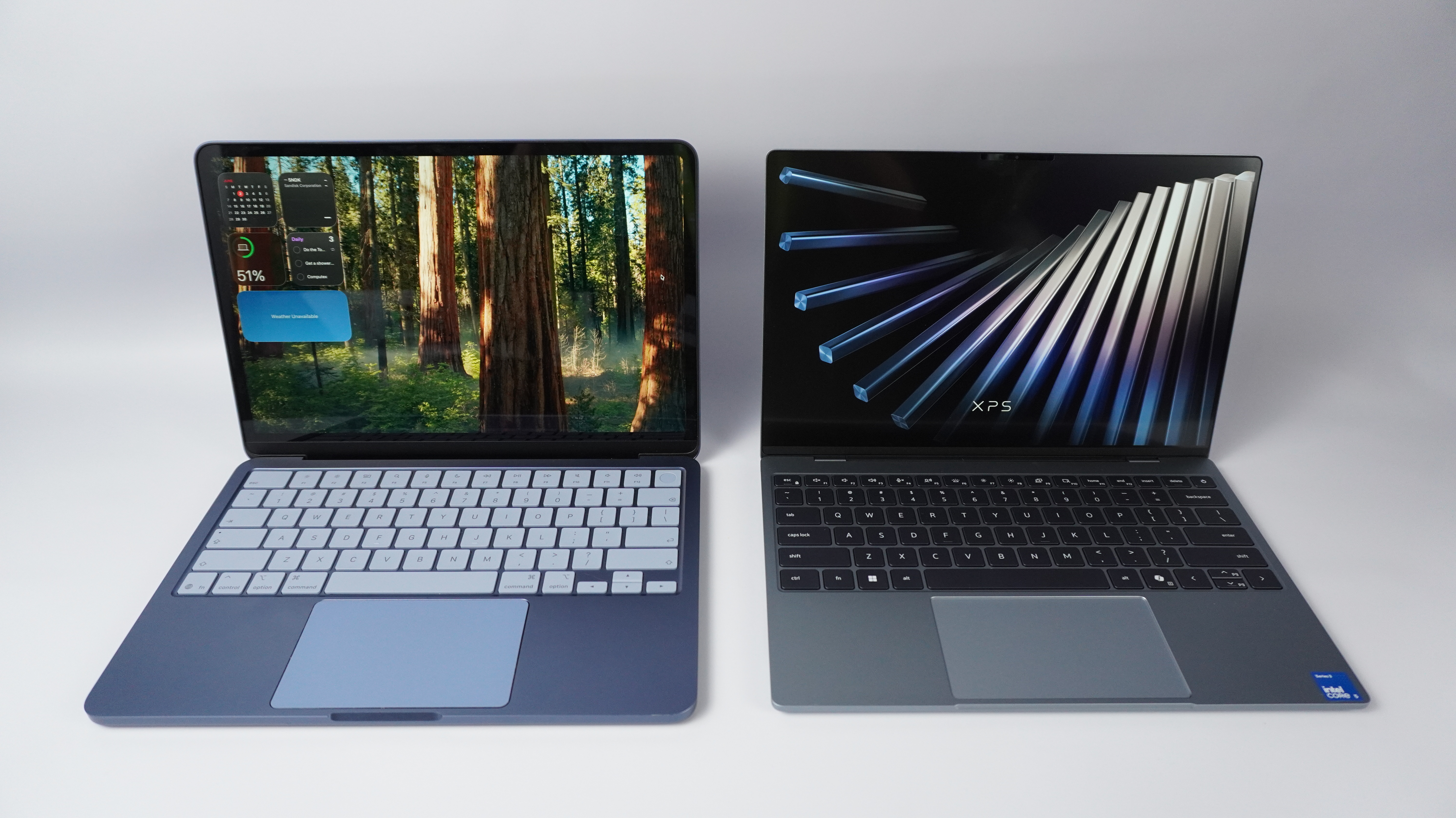 Dell XPS 13 next to MacBook Neo