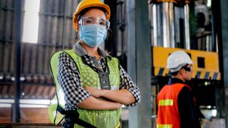 With mandatory facial coverings muffling speech, assisted listening devices are helping teams in noisy environments like factories to stay connected.