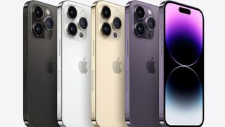 iPhone 14 Pro lined up next to each other in a series of different colors.