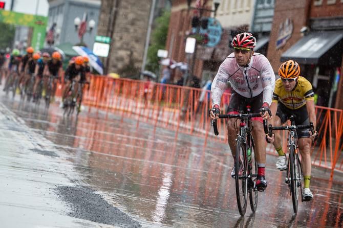 Luis Amaran (Jamis) is covered by Ryan Anderson (Optum) as he tries to sneak off the front