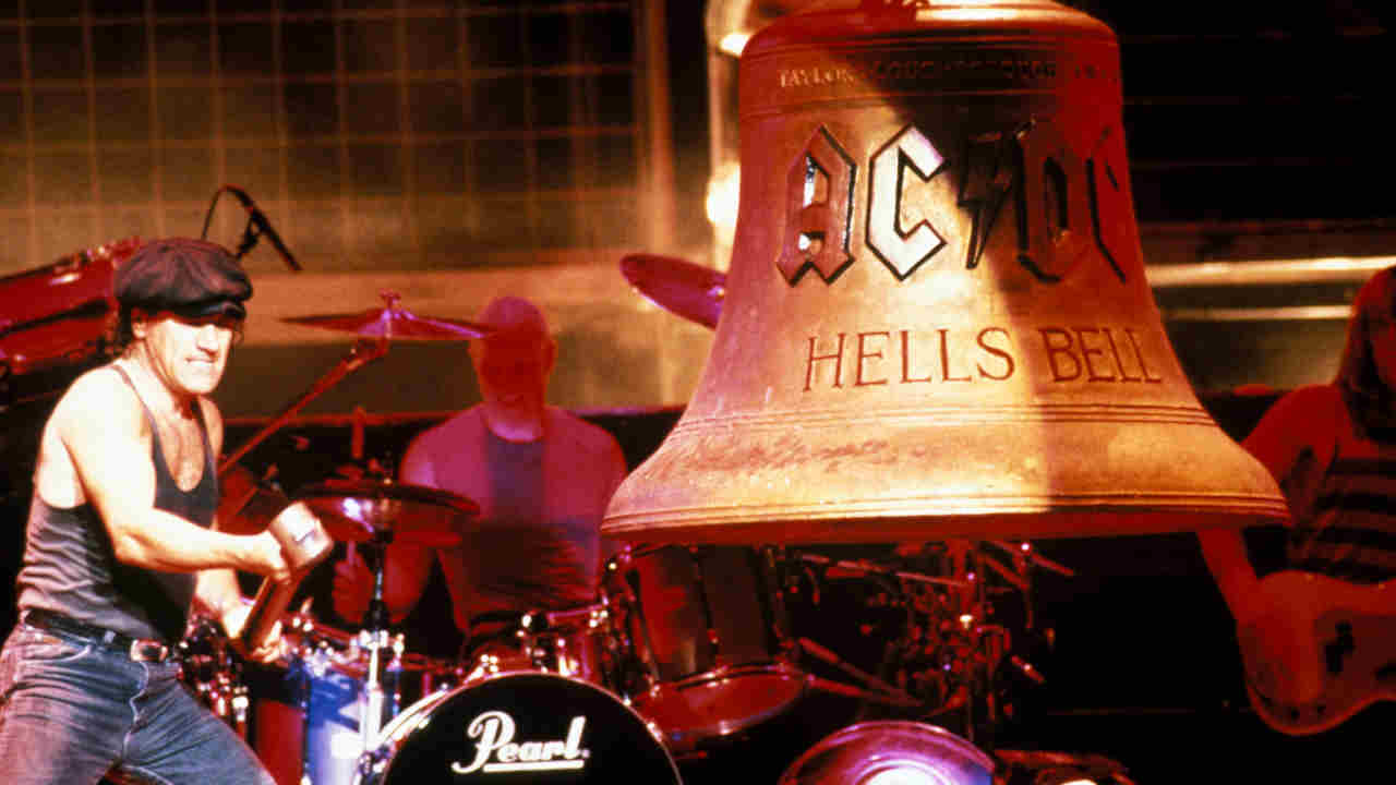 AC/DC’s Brian Johnson hitting a giant bell onstage in 1991