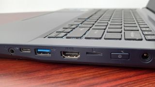 Side-on view of Origin PC laptop on desk
