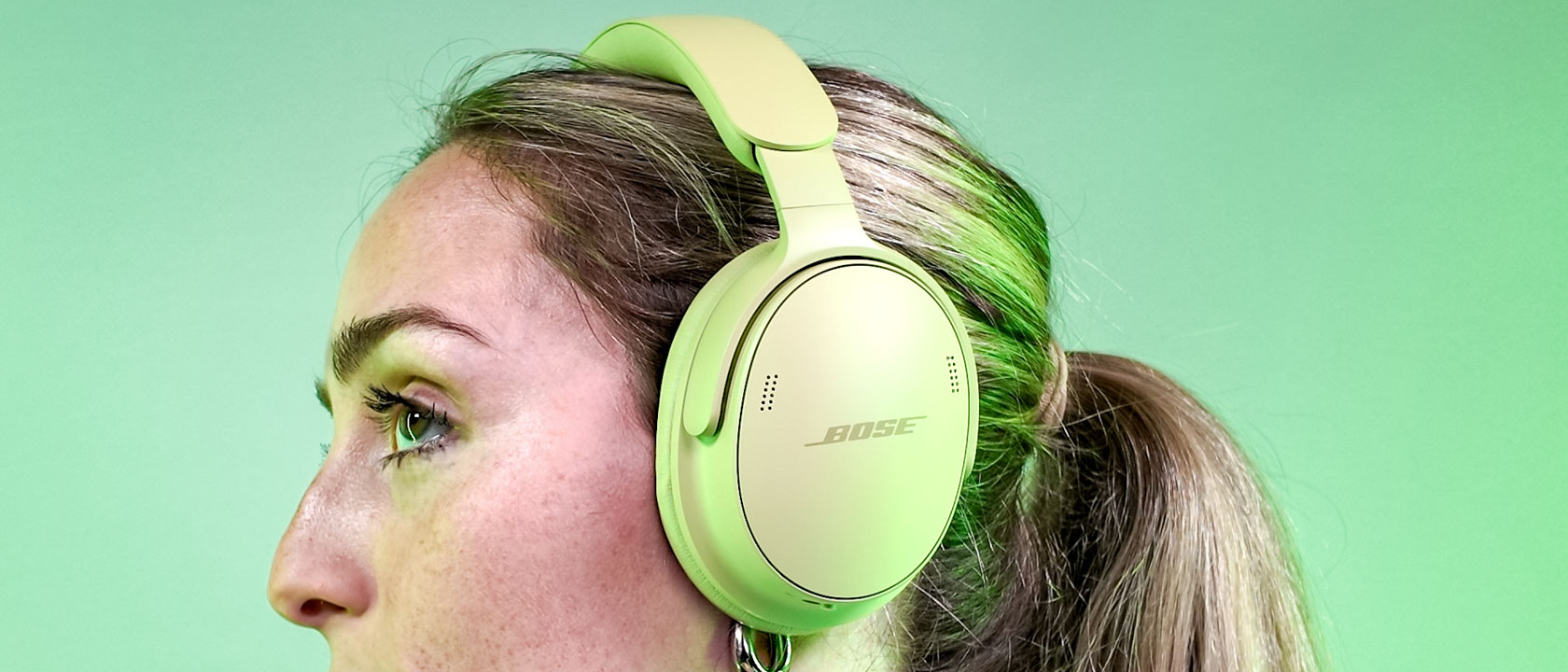 Tom's Guide editor Kate Kozuch wearing the Bose QuietComfort Headphones (2nd Gen)