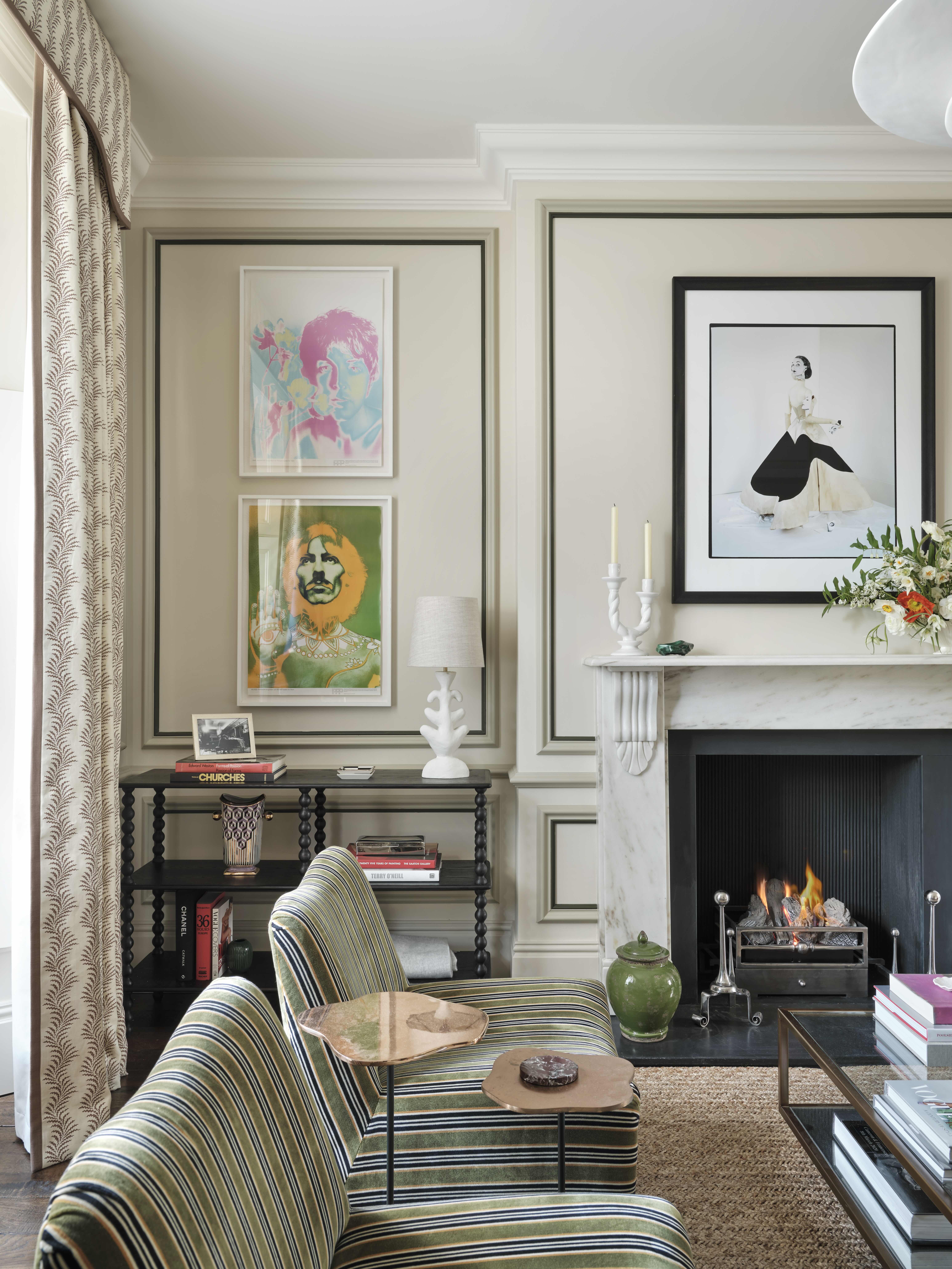 A contemporary living room painted in neutral white, with trim in grey and black