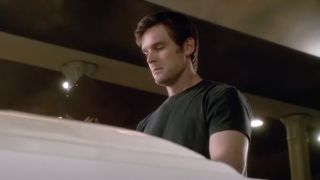 Nate Fisher (Peter Krause) is at a funeral on Six Feet Under