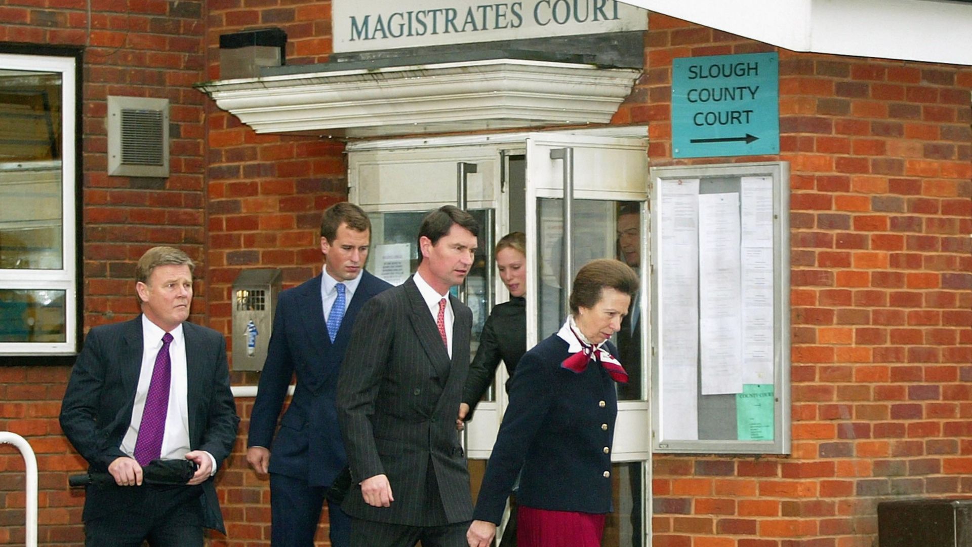 Princess Anne leaving court with Timothy Laurence and Peter Phillips