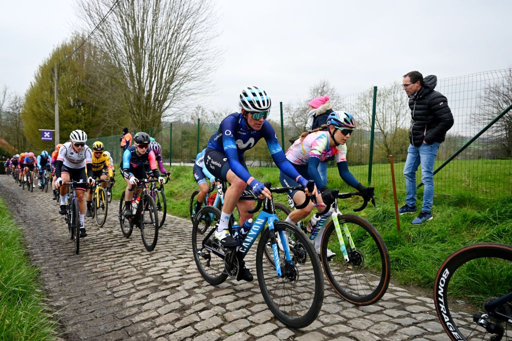 OUDENAARDE BELGIUM APRIL 02 LR Aude Biannic of France and Movistar Team and Elise Chabbey of Switzerland and Team CanyonSRAM Racing compete passing through a cobblestones sector during the 20th Ronde van Vlaanderen Tour des Flandres 2023 Womens Elite a 1566km one day race from Oudenaarde to Oudenaarde UCIWWT on April 02 2023 in Oudenaarde Belgium Photo by Luc ClaessenGetty Images