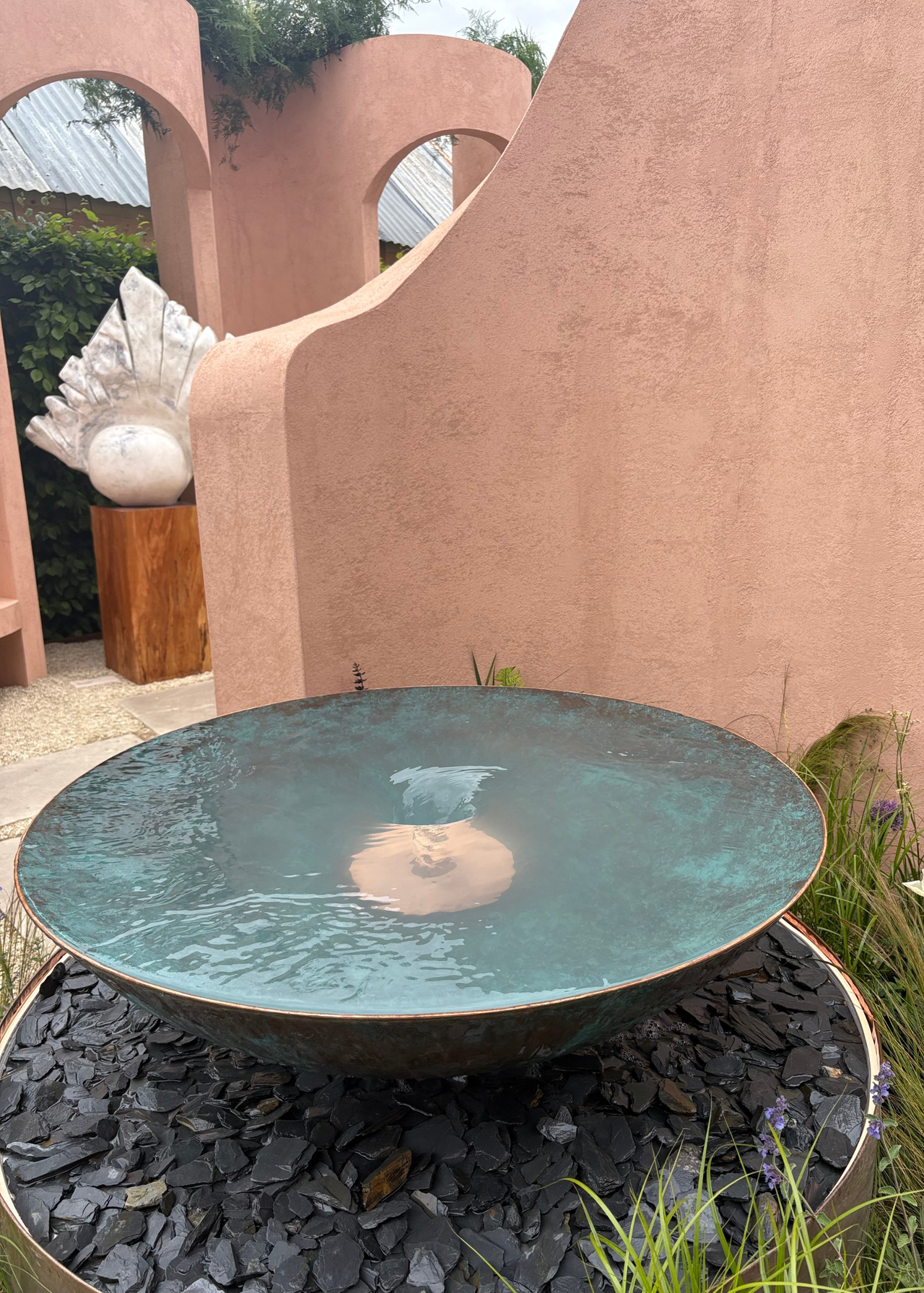 A brass water feature at the Chelsea Flower Show 2026