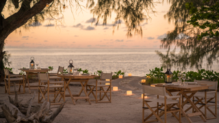 Restaurant on the beach at Four Seasons Desroches Island.