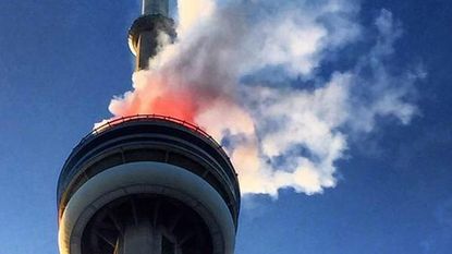 Smoke from the top of the CN Tower in Toronto.
