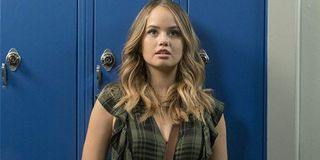 Insatiable Debby Ryan leaning against the lockers in the hall