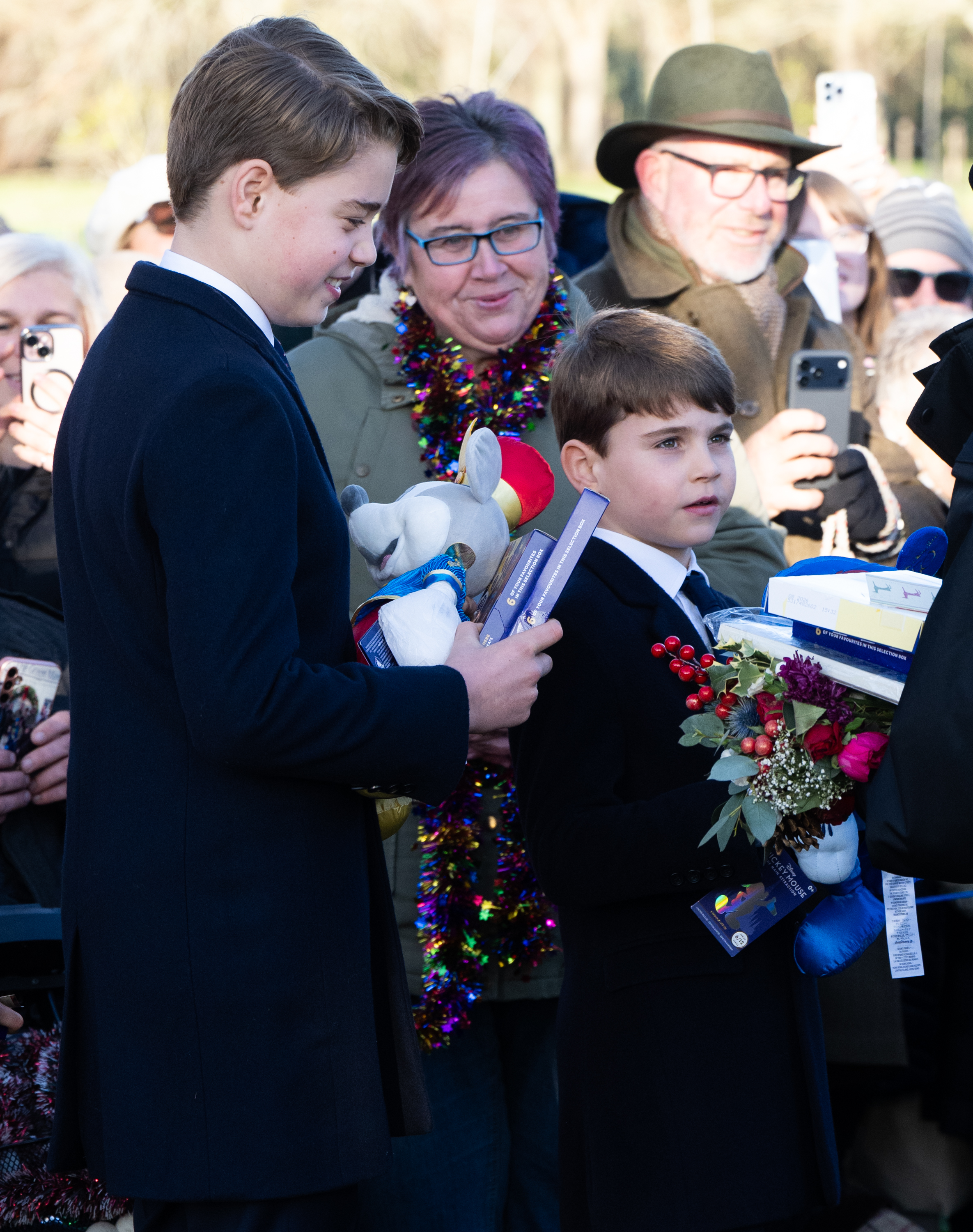 Prince George and Prince Louis greeting fans on Christmas