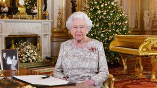 Queen Elizabeth II recording a Christmas message inside Buckingham Palace
