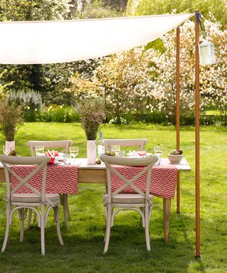 Outdoor birthday party ideas with table and canopy