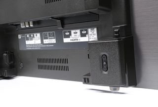 The connections on the rear of a flatscreen TV. Three HDMI sockets are visible, with one labelled 'ARC'