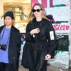 Angelina Jolie wearing an all-black outfit while out with her son Pax