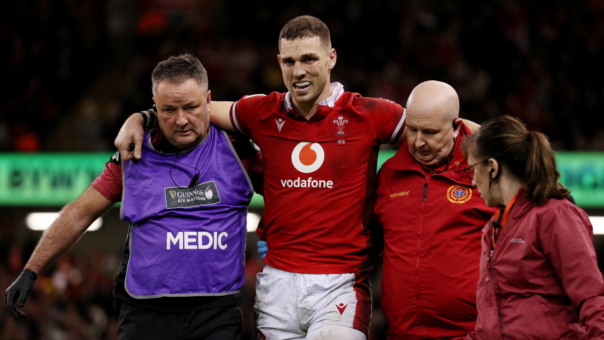 George North leaves the field with an injury after receiving medical treatment during the Guinness Six Nations 2024 match between Wales and Italy