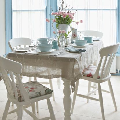 dining area with wooden flooring and dining set